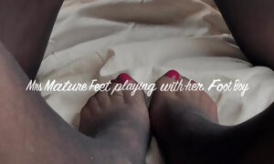 Mrs Mature Feet allowing her foot boy some more fun