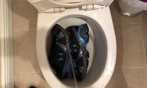 Peeing Under Armour sneakers