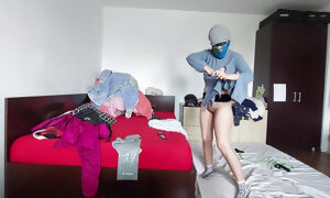 Amateur mom tries on clothes and cuts them.
