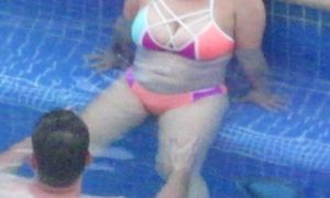 Red-hot swimsuit phat ass white girl cougar with ginormous knockers in swimming pool Pt1