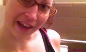 Goddess Amanda Peeing in the Toilet Wearing Glasses