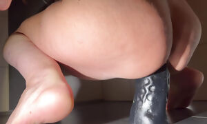 Milf rides fat dildo