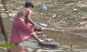 Desi mature aunty bathing in pond privately recorded
