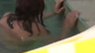 My wife in the pool with her best friend's son&comma; they masturbate and cum on her hairy pussy