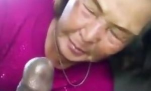 Japanese grannie sucks black trouser snake In The truck